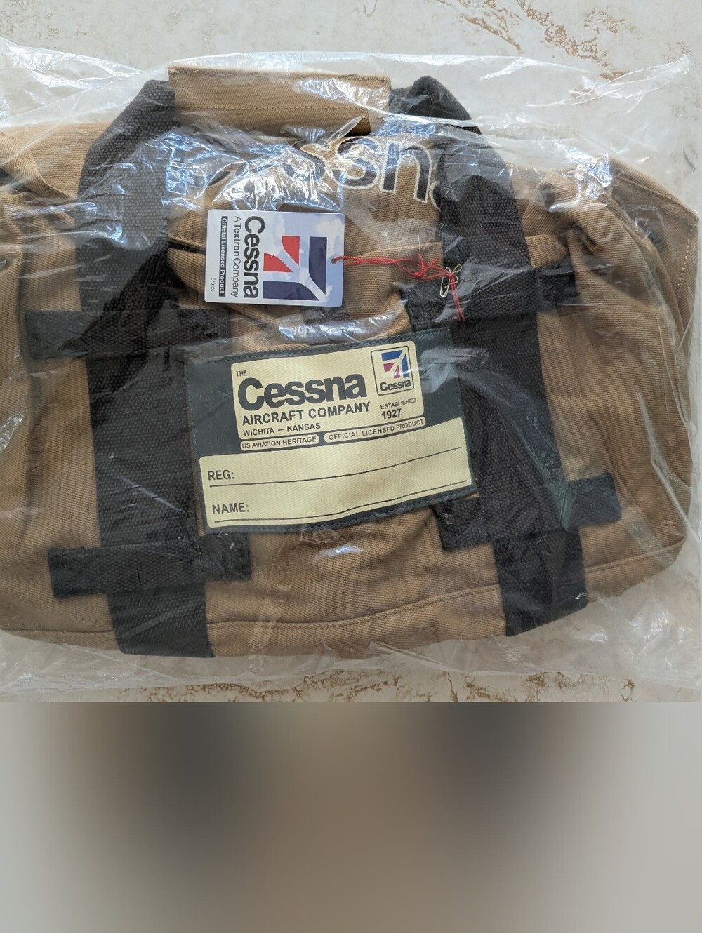 Men's Tan and Black Duffel Bag